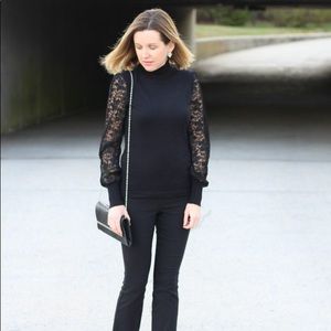 Lace sleeve black mock turtleneck by Vince Camuto.